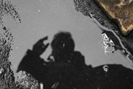 Self-portrait with stone